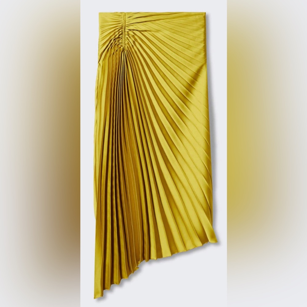 Pleated asymmetric skirt